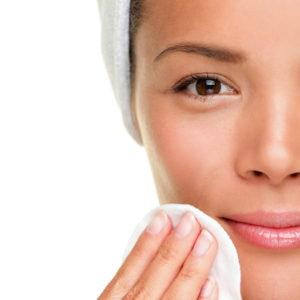 skin care woman removing makeup 300x300 Reduce Skin Pores With These Easy Tips